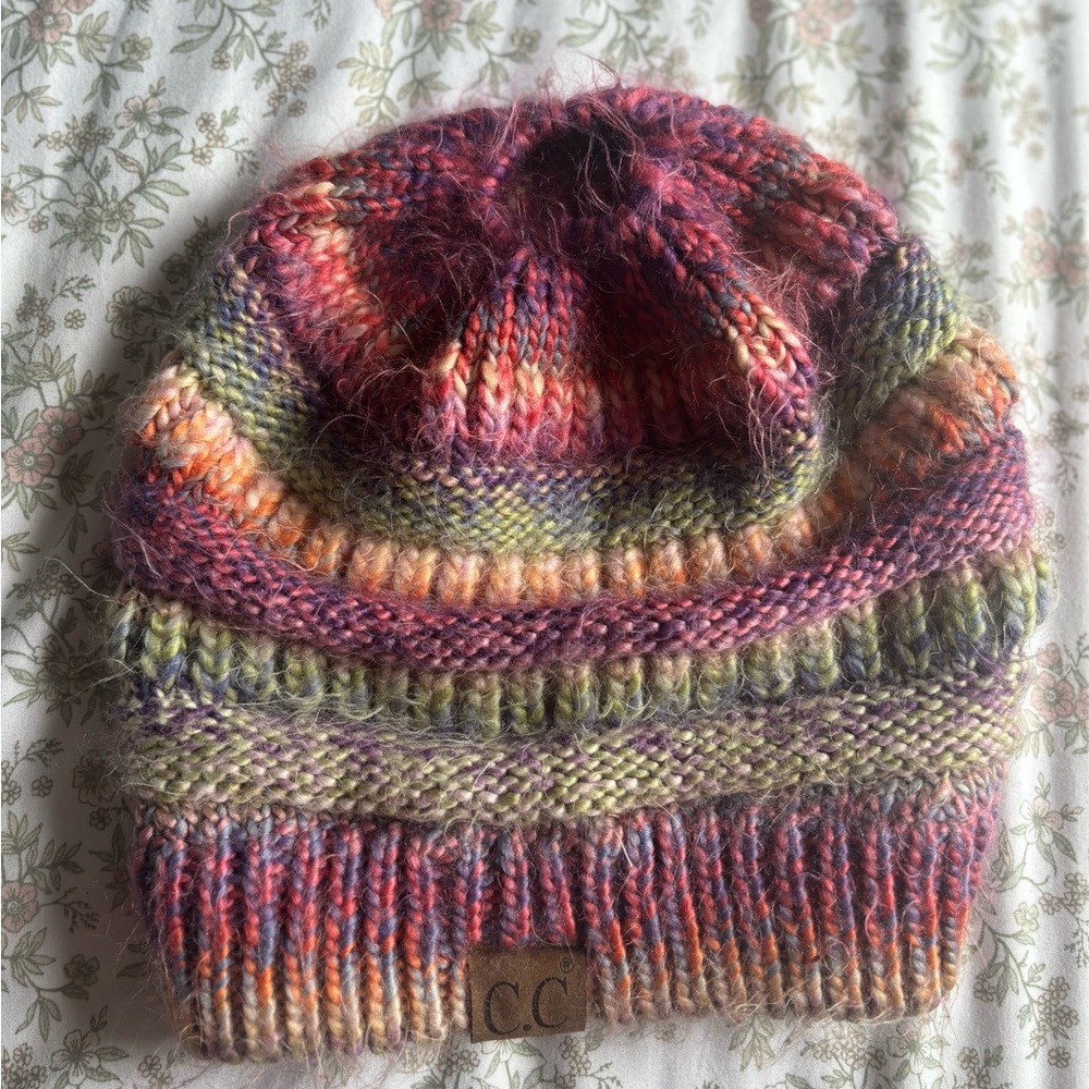 C.C Multicolor Knit Beanie by with ponytail hole.